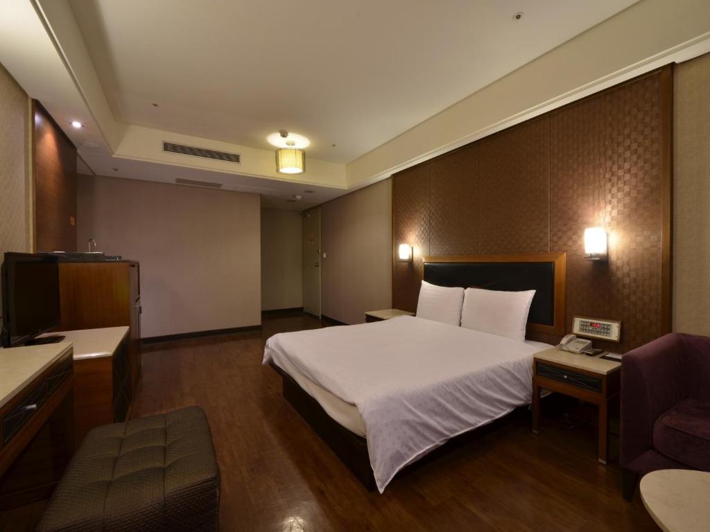 Goodness Plaza Hotel - Grande Quarto Individual