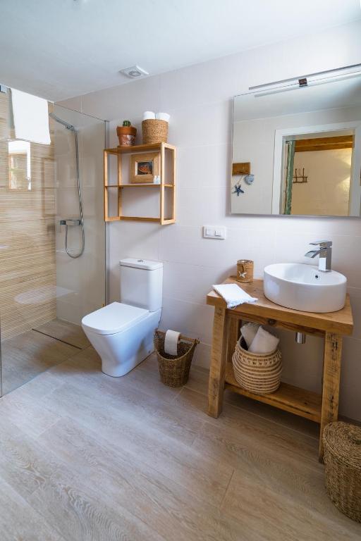 Koupelna v ubytování Calma Hotel