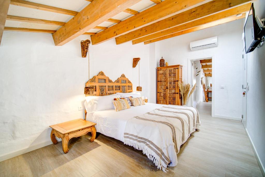 Postel nebo postele na pokoji v ubytování Calma Hotel