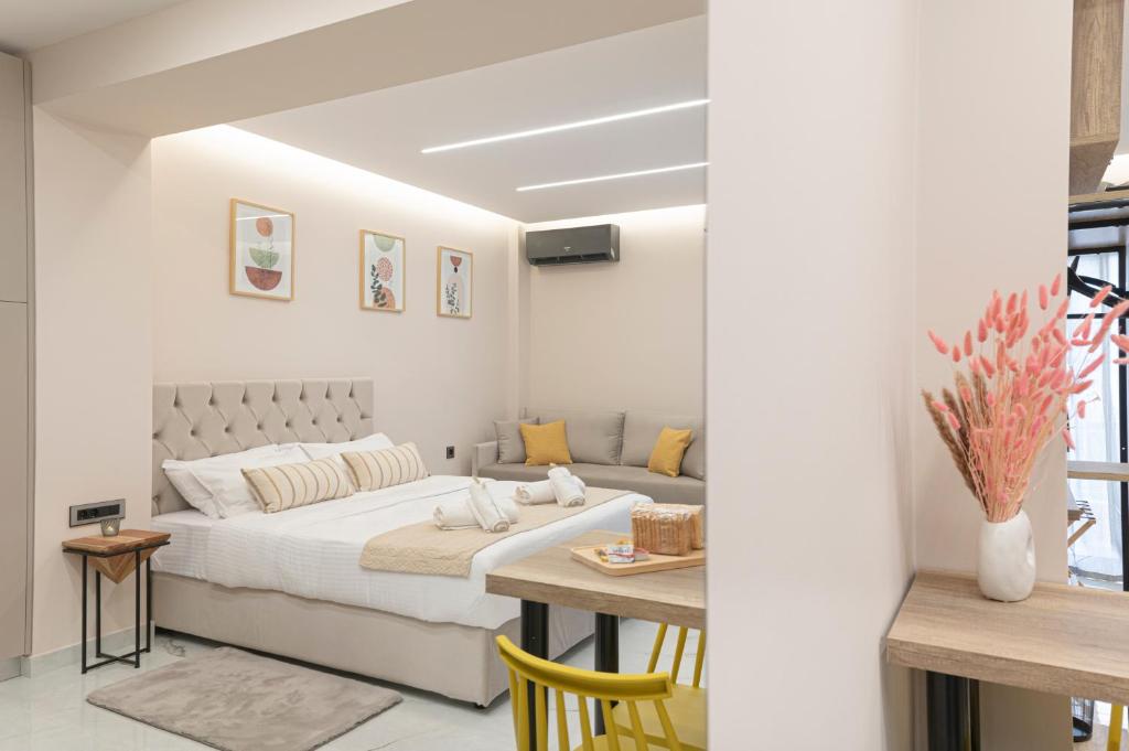 Postel nebo postele na pokoji v ubytování Elite Suite Loutraki