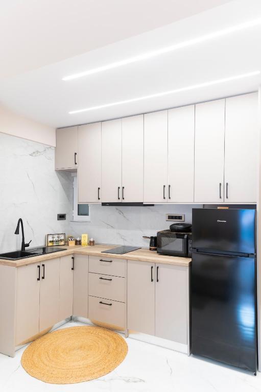 Kuchyň nebo kuchyňský kout v ubytování Elite Suite Loutraki