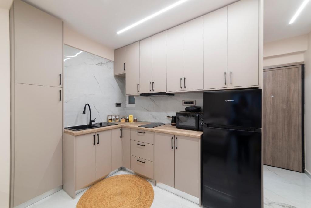 Kuchyň nebo kuchyňský kout v ubytování Elite Suite Loutraki