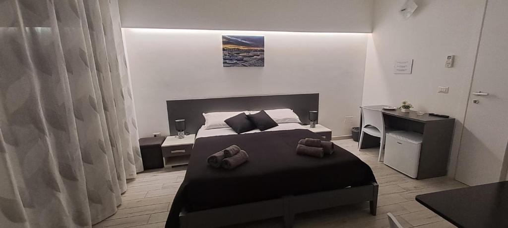 Postel nebo postele na pokoji v ubytování biRose B&B Affittacamere