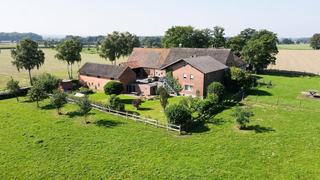 an aerial view of a house in a field at Haus Helga in Salzkotten
