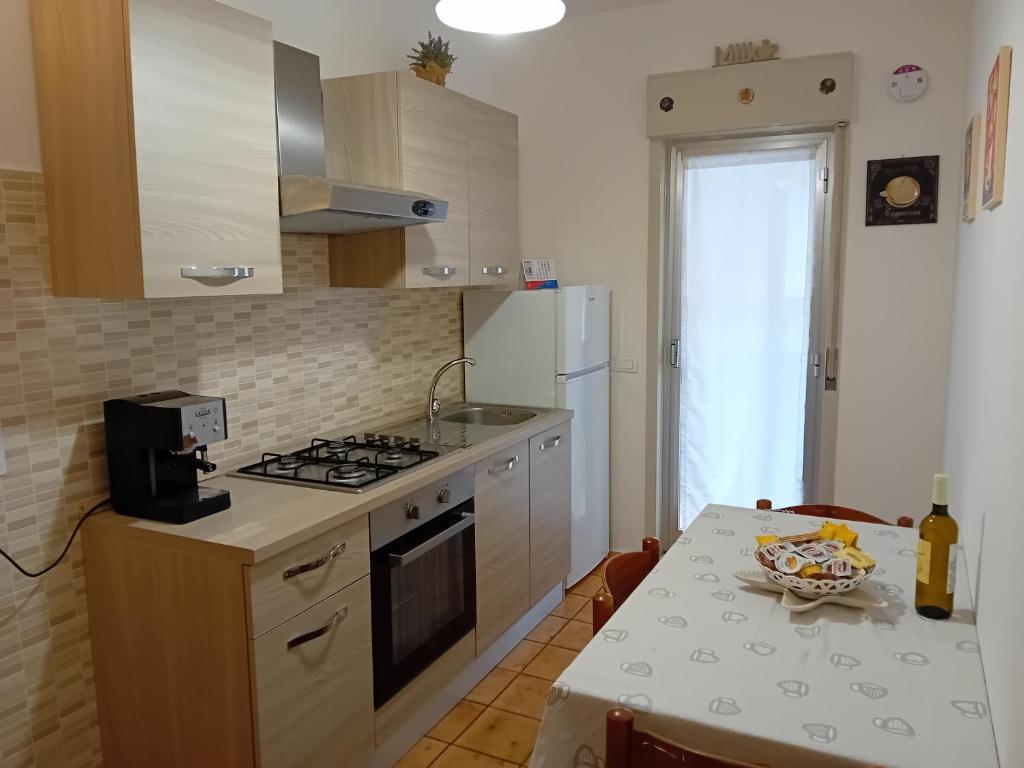 Kuchyň nebo kuchyňský kout v ubytování Casa "Sole Naxos"