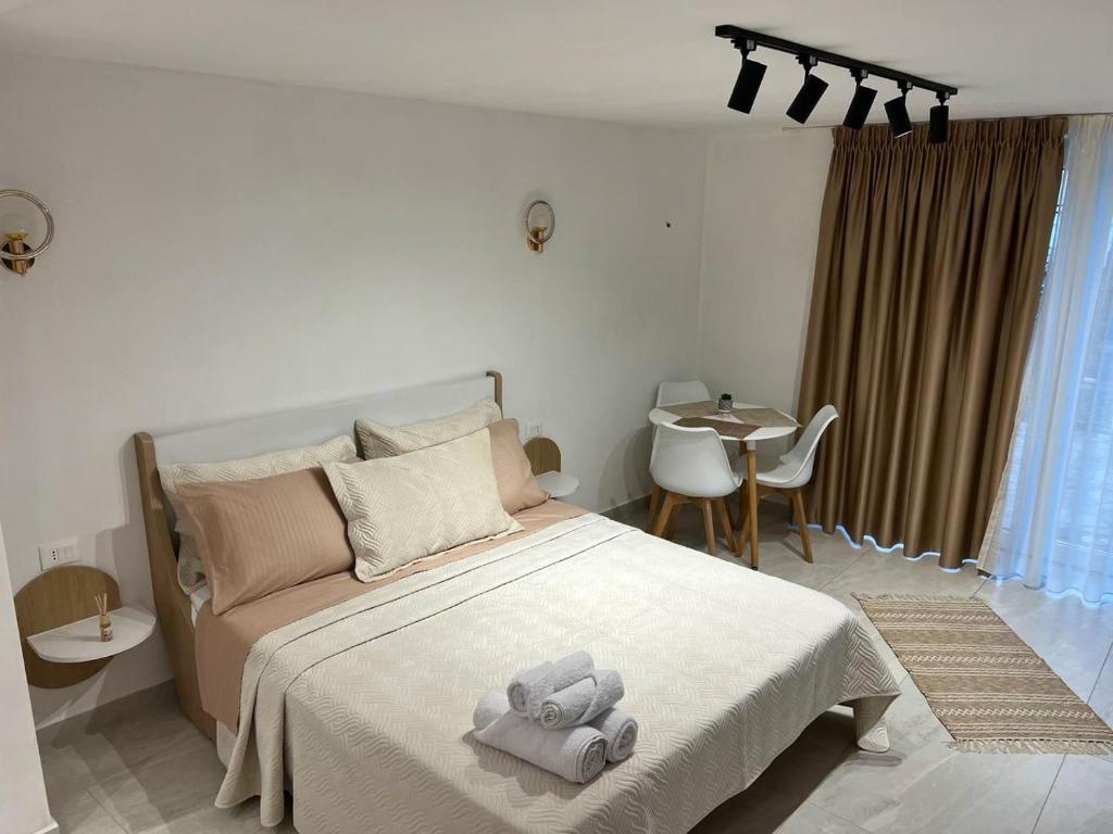 Postel nebo postele na pokoji v ubytování Aloha House