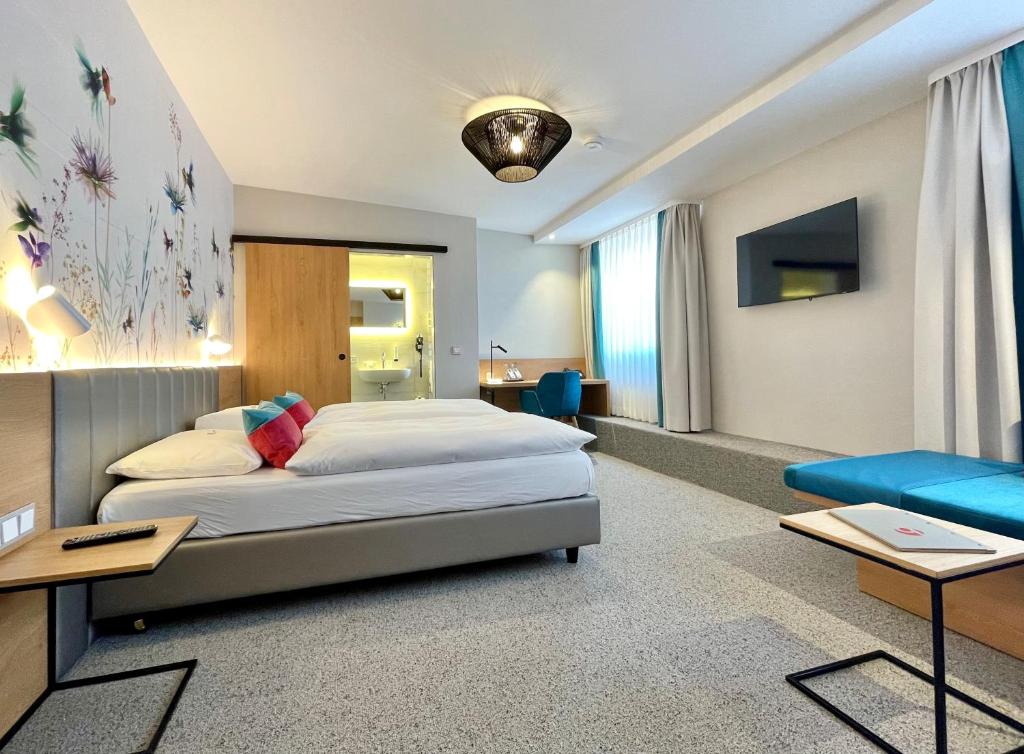 TV a/nebo společenská místnost v ubytování Hotel Boehler