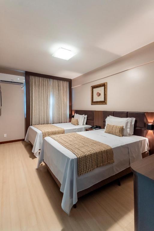 Postel nebo postele na pokoji v ubytování Copas Verdes Hotel