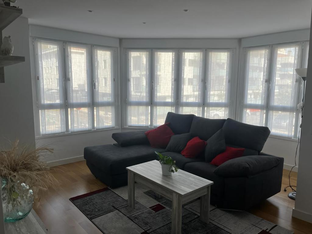 Posezení v ubytování Apartamento moderno y acogedor ideal familias