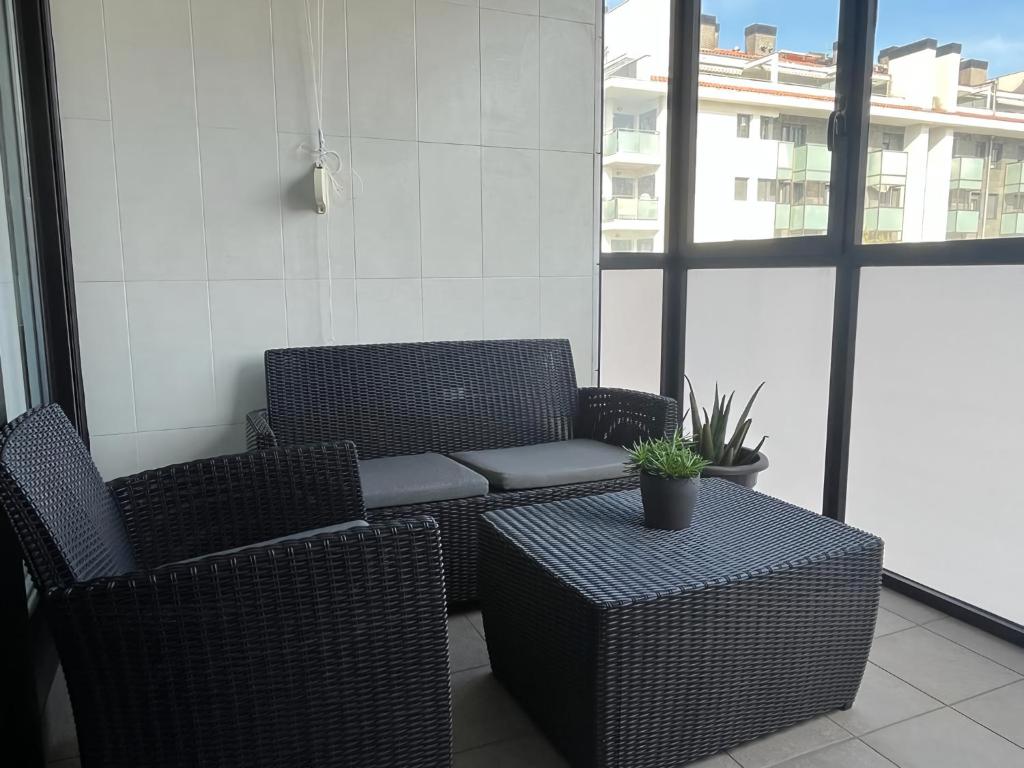 Posezení v ubytování Apartamento moderno y acogedor ideal familias