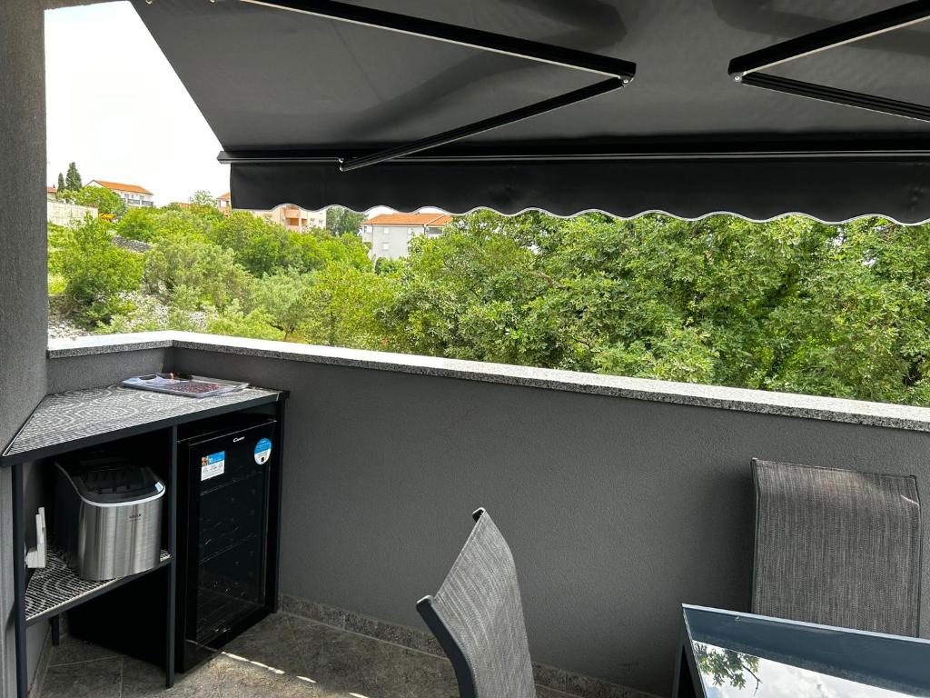 Balkón nebo terasa v ubytování Apartmani Jedro
