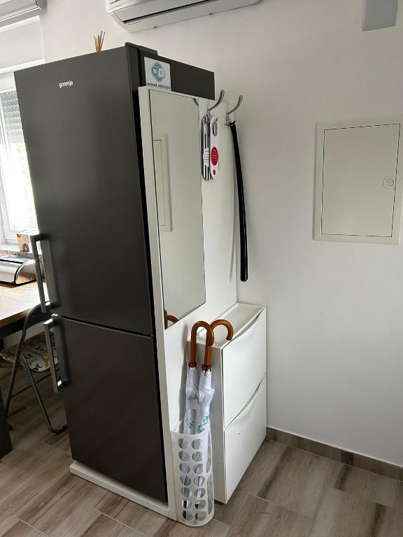 Kuchyň nebo kuchyňský kout v ubytování Apartmani Jedro