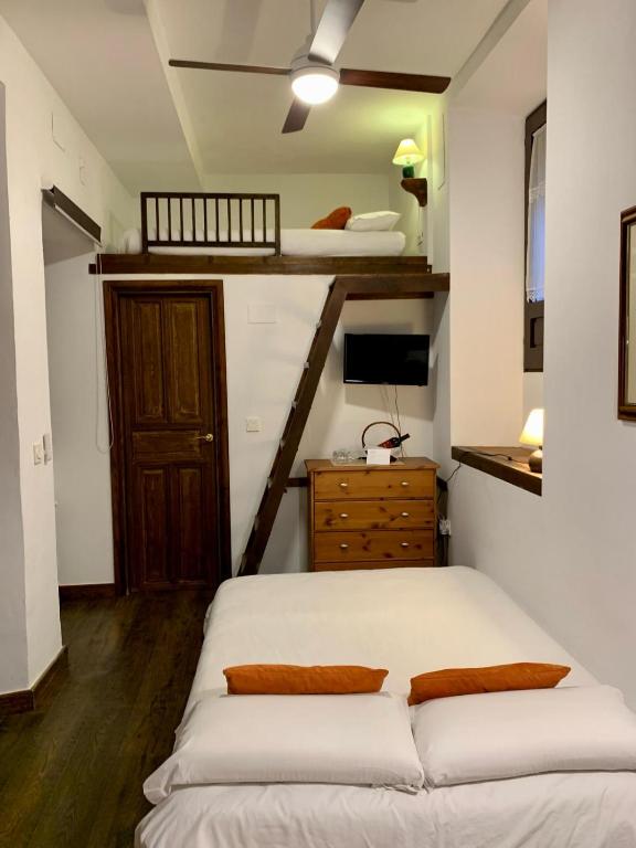 Cama o camas de una habitación en Casa del Cantaor