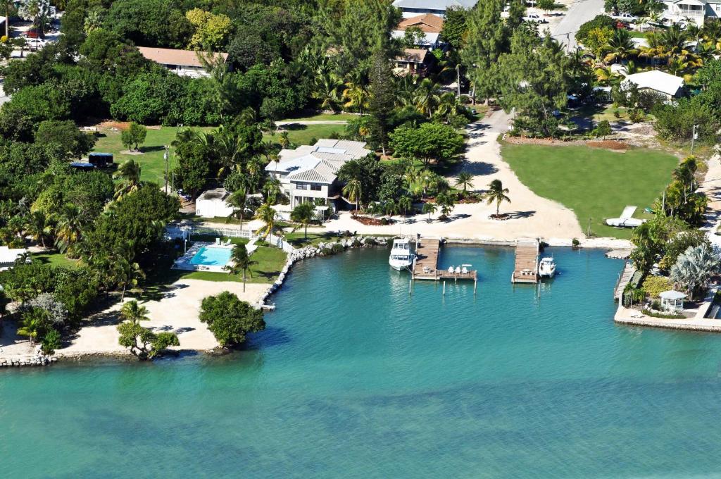 an aerial view of a beach with boats in the water at Seascape Resort & Marina in Marathon