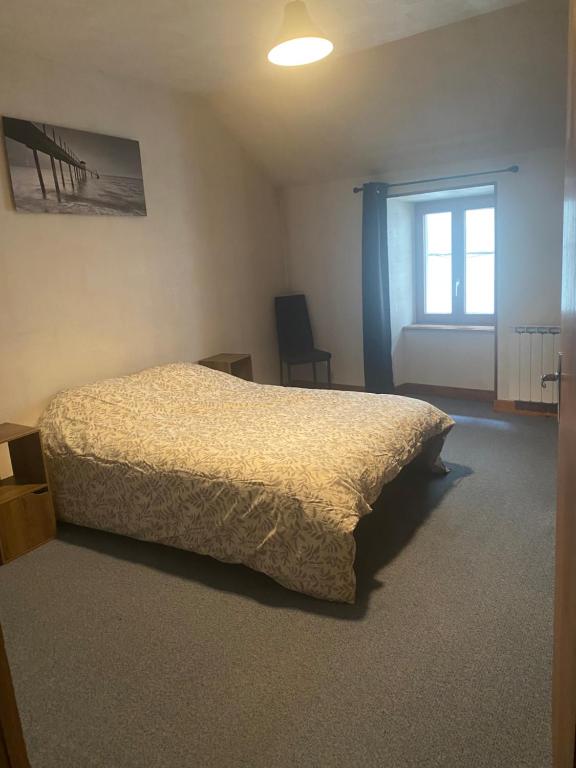 Postel nebo postele na pokoji v ubytování Grand appartement