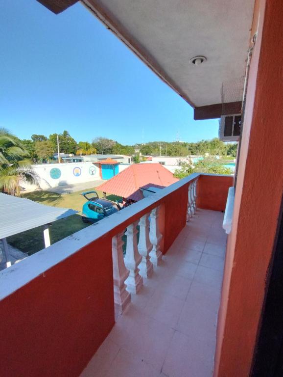 a balcony of a house with a view of the ocean at Las Villas Champoton in Champotón