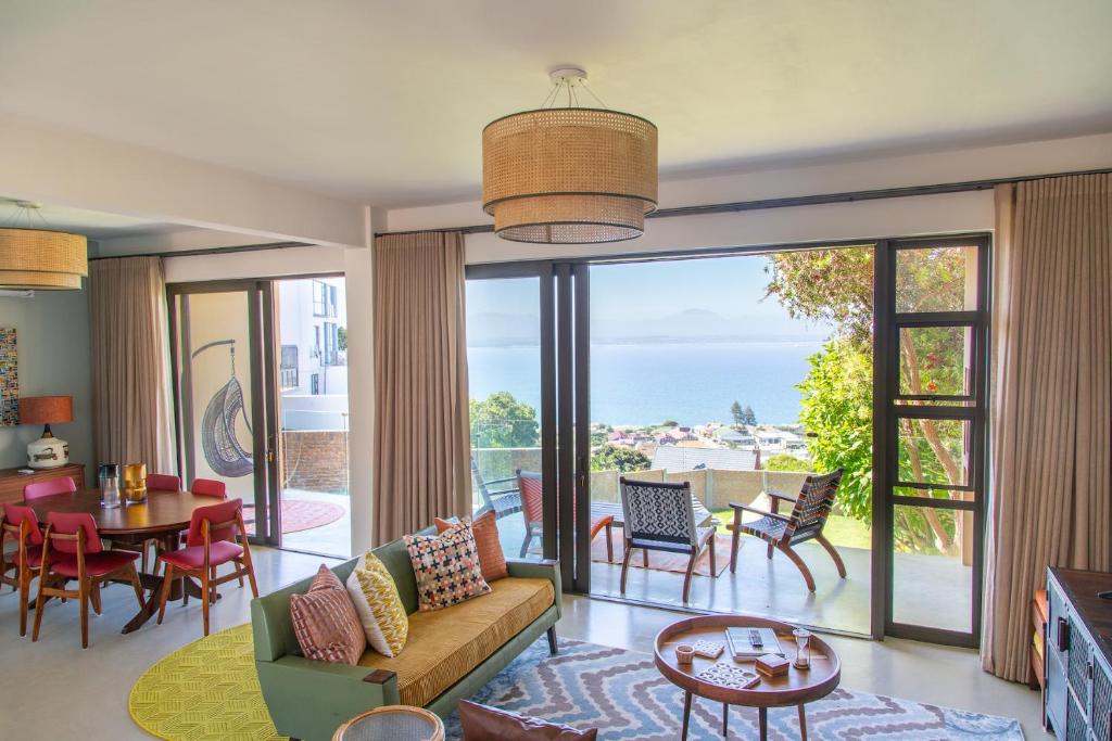 a living room with a view of the ocean at Cape St. Blaize in Mossel Bay