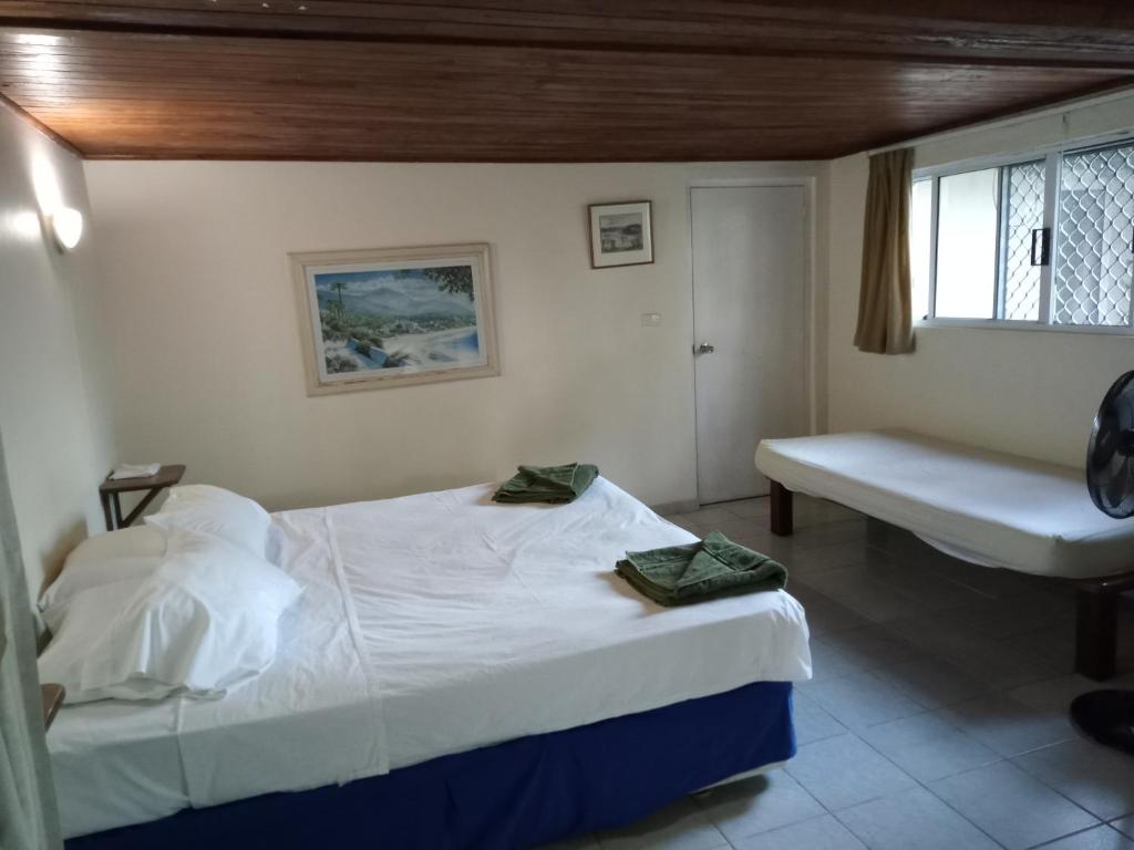 Postel nebo postele na pokoji v ubytování Seachange Lodge