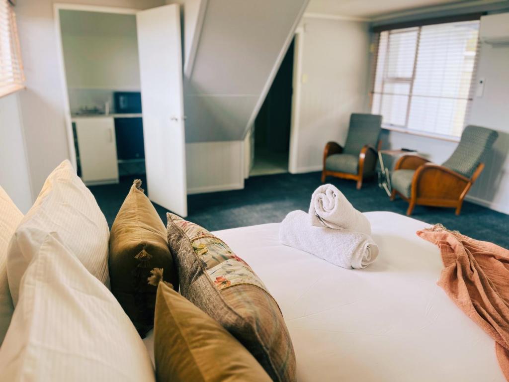Postel nebo postele na pokoji v ubytování Kurow Motel