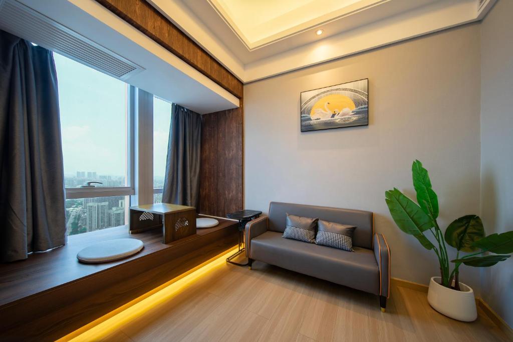 Posezení v ubytování Xingyin Cloudy Hotel Guangzhou Changgang Subway Station - Free Shuttle Bus to Canton Fair Complex During Canton Fair Period