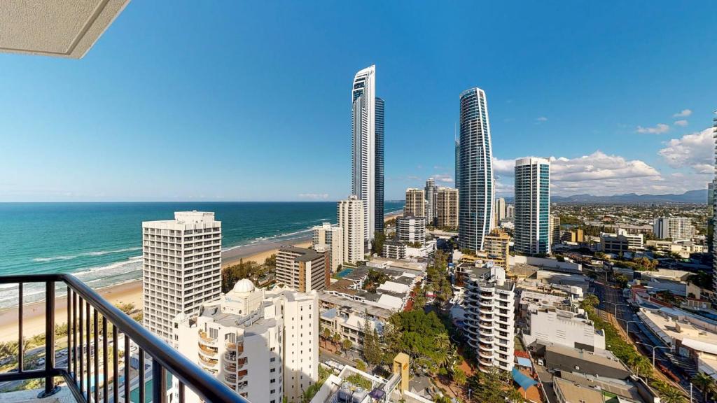 a view of a city with the ocean and buildings at Cosy Studio with Stunning Ocean Views DUPLICATE in Gold Coast