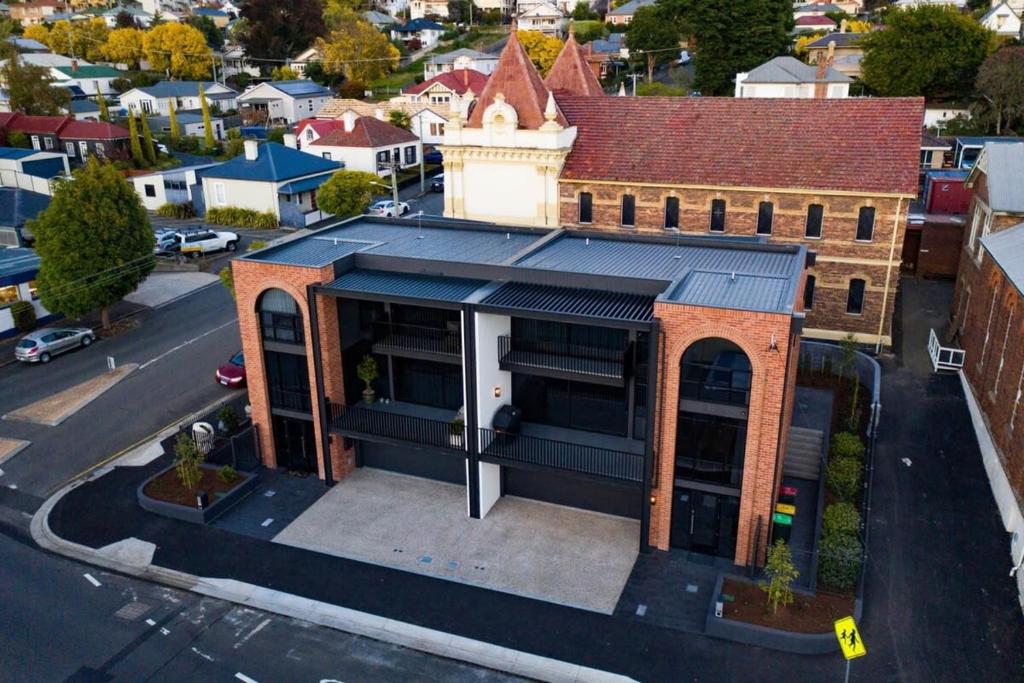 an overhead view of a building in a city at Stunning Apartment in the CBD with Parking & WiFi in Launceston