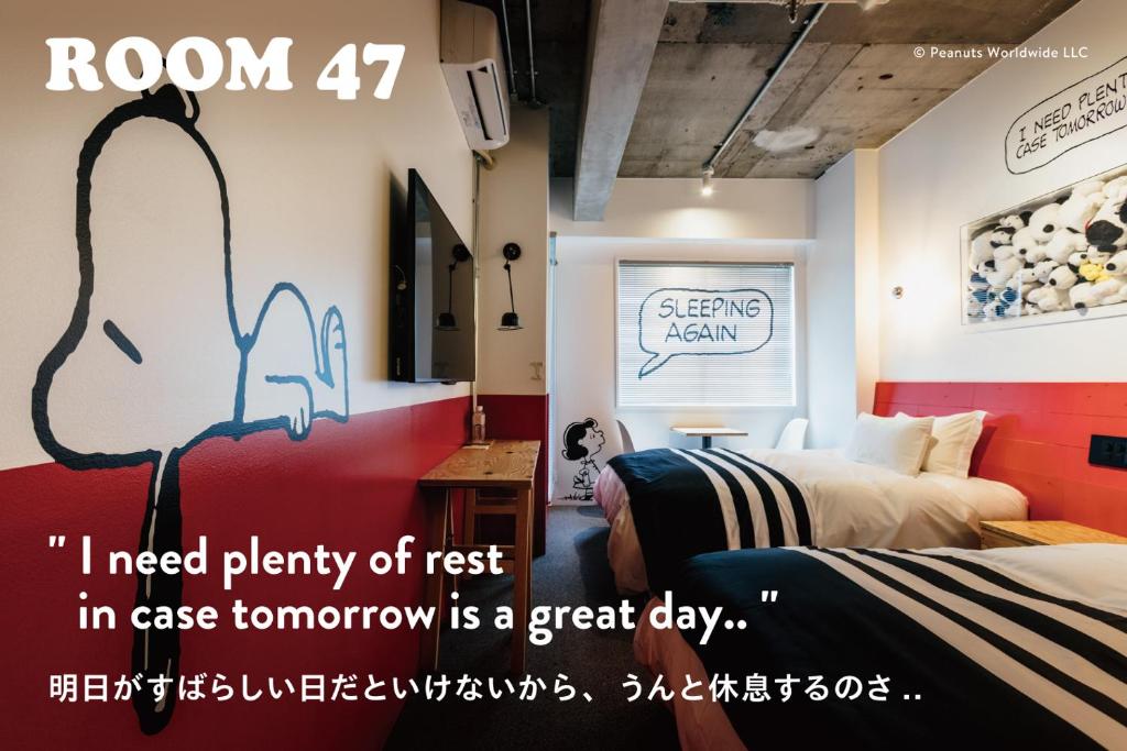 Postel nebo postele na pokoji v ubytování ピーナッツホテル/PEANUTS HOTEL