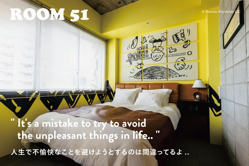 Postel nebo postele na pokoji v ubytování ピーナッツホテル/PEANUTS HOTEL