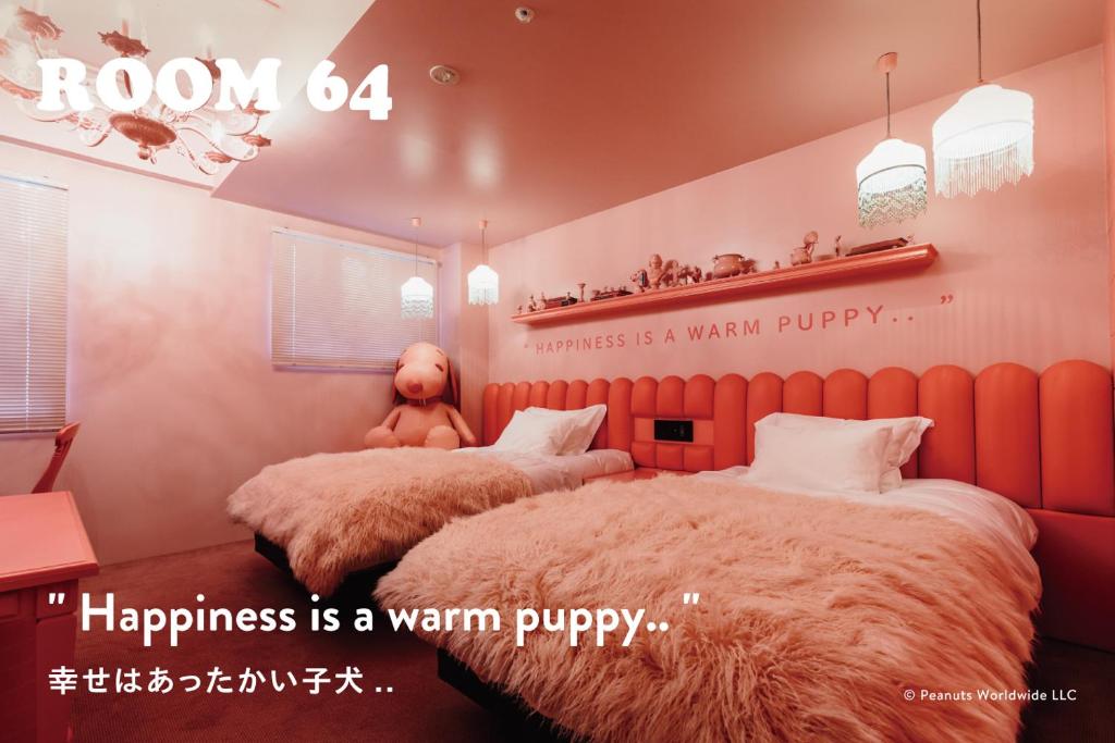Postel nebo postele na pokoji v ubytování ピーナッツホテル/PEANUTS HOTEL