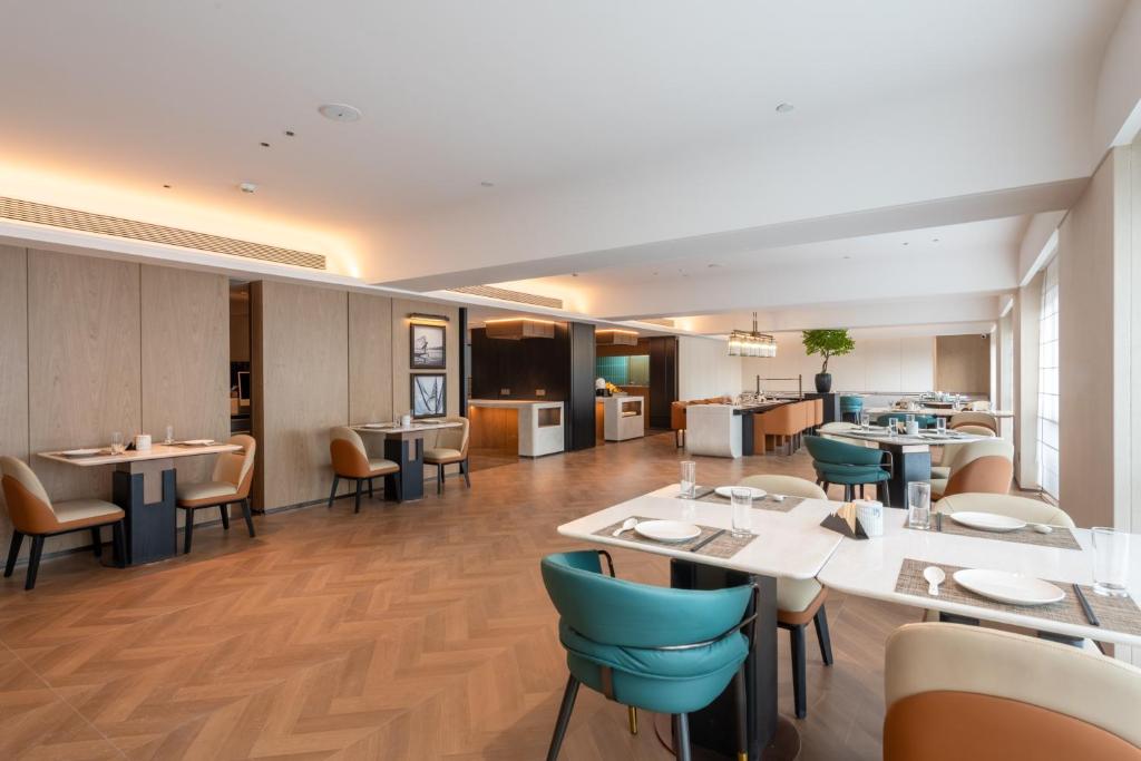 Posezení v ubytování Mehood Lestie Hotel Pazhou Convention and Exhibition Center Branch - Free Shuttle Bus to Canton Fair Complex During Canton Fair Period