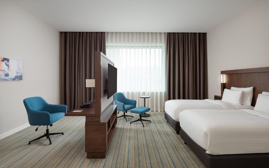 Postel nebo postele na pokoji v ubytování Courtyard by Marriott Baku