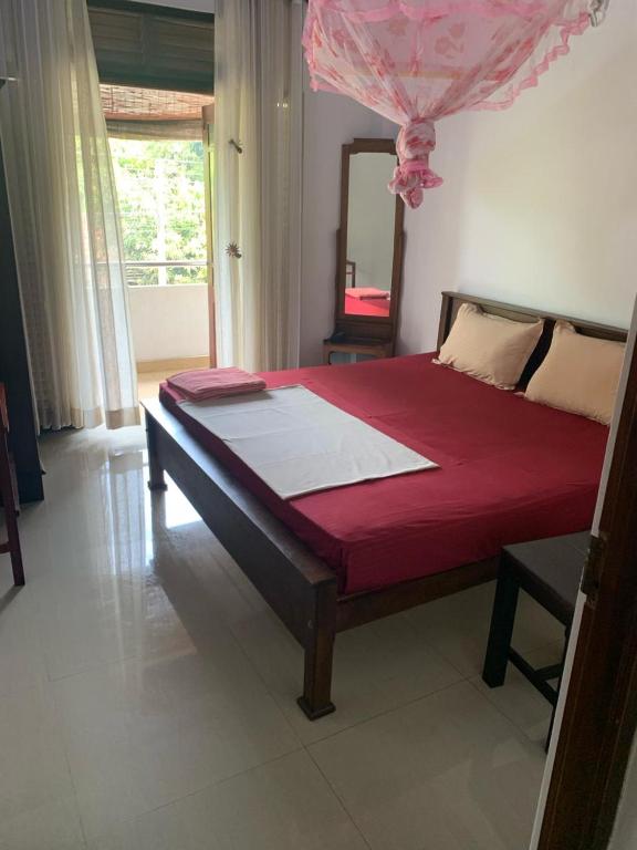 Postel nebo postele na pokoji v ubytování Serendip Villa Holiday HomeTalalla Sri Lanka