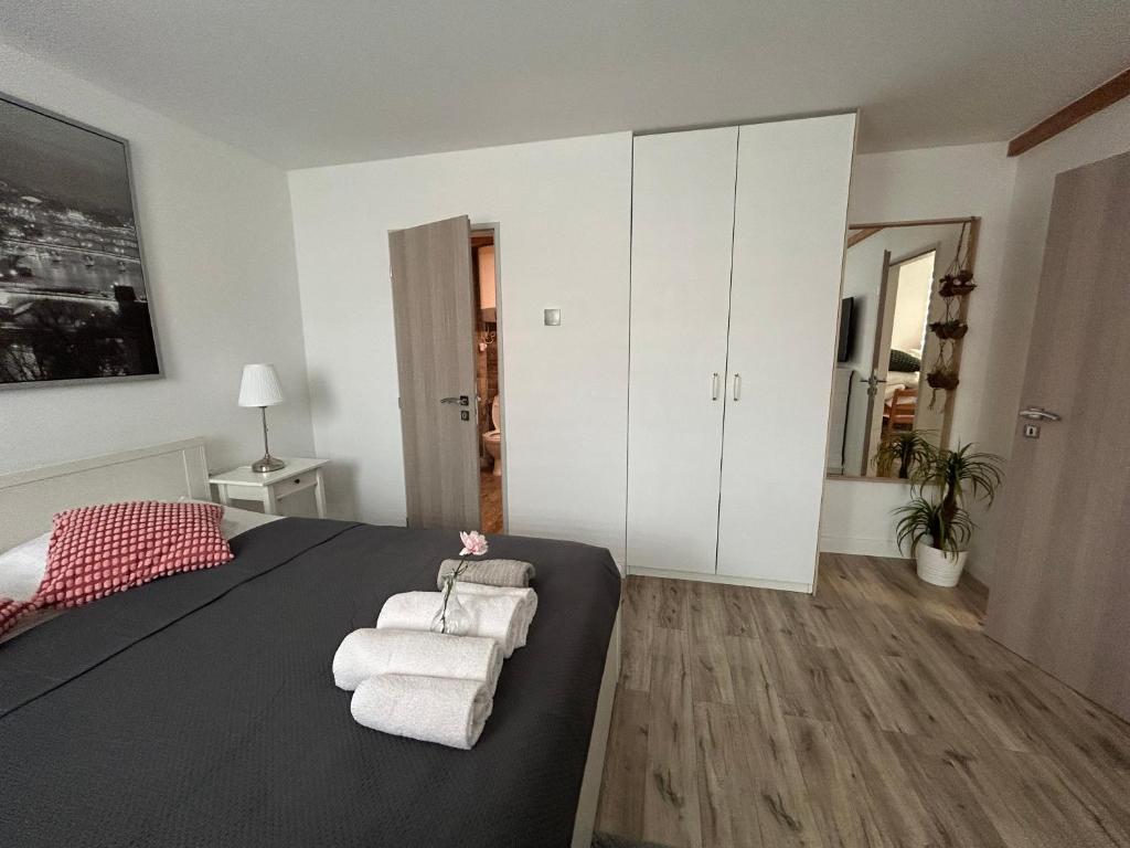 Postel nebo postele na pokoji v ubytování Apartmány Ellie