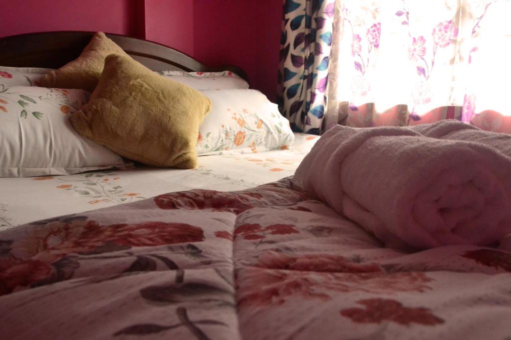 Postel nebo postele na pokoji v ubytování Salakha Homestay