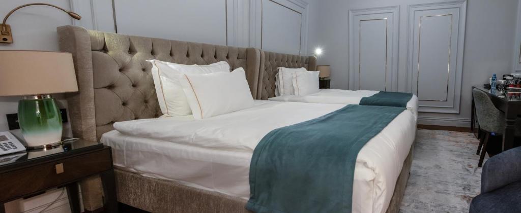 Postel nebo postele na pokoji v ubytování Xheko Imperial Luxury Hotel & SPA