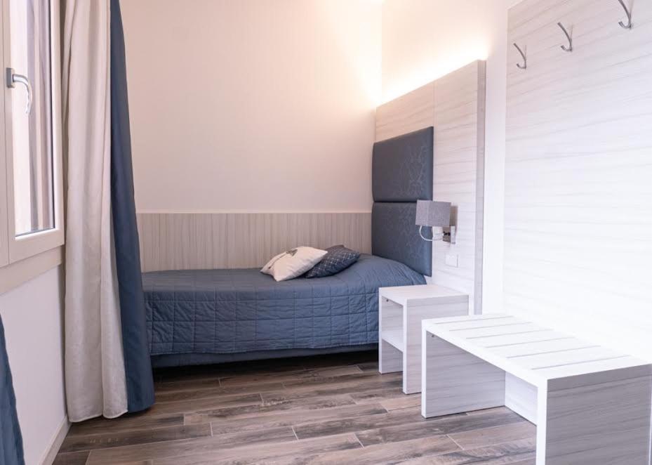 Postel nebo postele na pokoji v ubytování Guest House DOLCE LAGUNA 2
