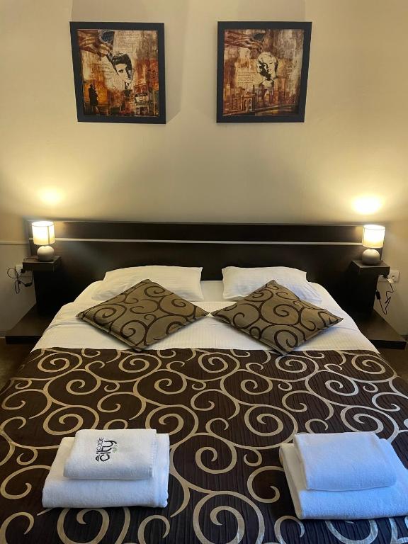 Letto o letti in una camera di City Code In Joy