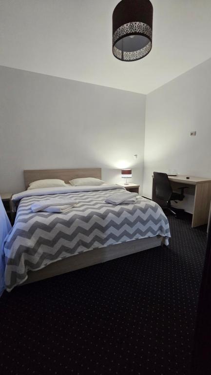 Ένα ή περισσότερα κρεβάτια σε δωμάτιο στο Casa Soficu
