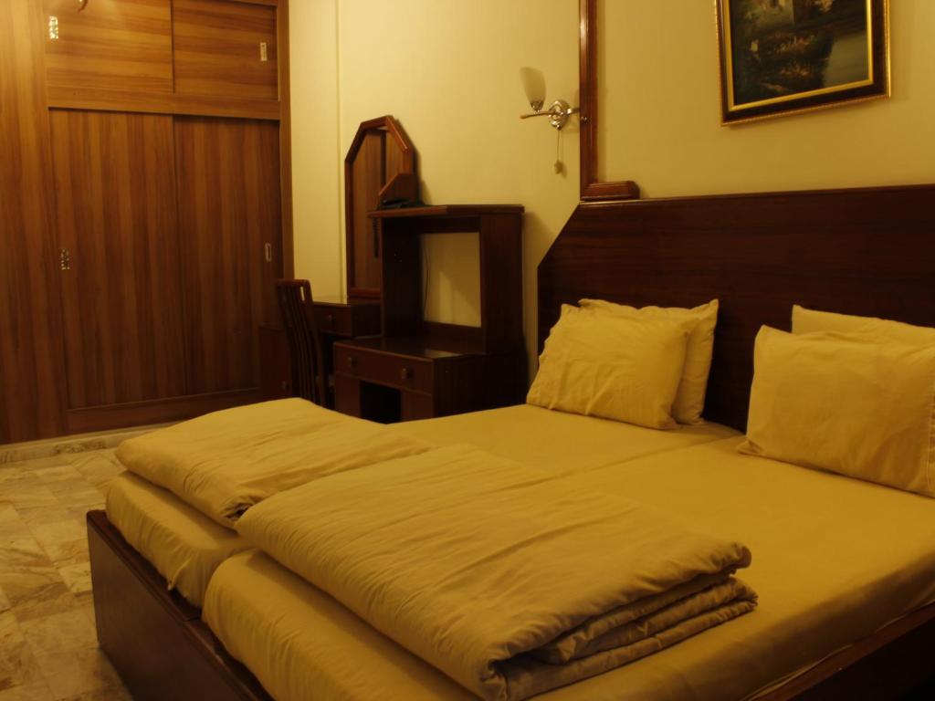 Postel nebo postele na pokoji v ubytování Viccini Suites