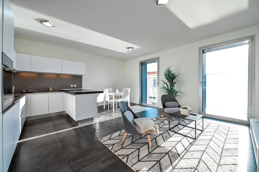 Kuchyň nebo kuchyňský kout v ubytování Lake View Suite Melide