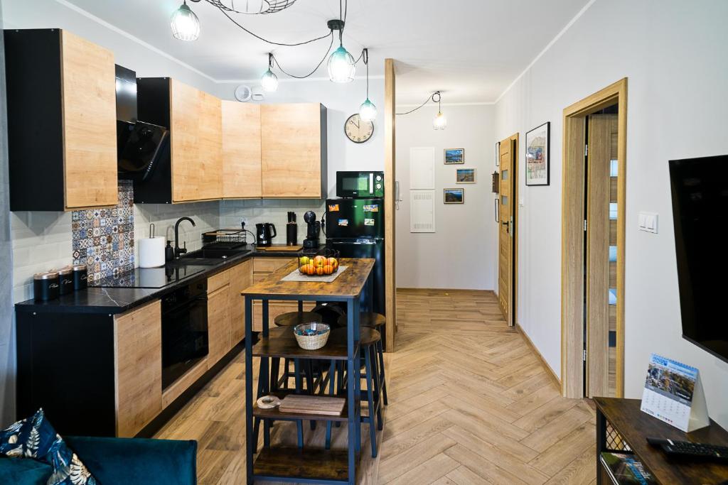 Kuchyň nebo kuchyňský kout v ubytování Apartament Tatarska Przemyśl