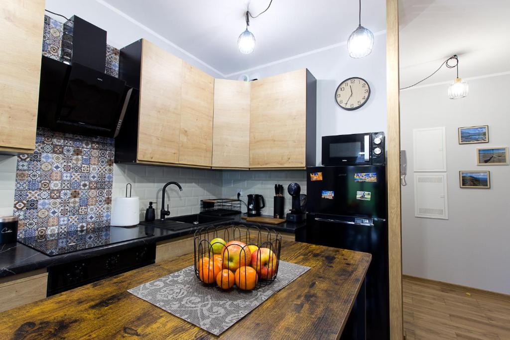 Kuchyň nebo kuchyňský kout v ubytování Apartament Tatarska Przemyśl