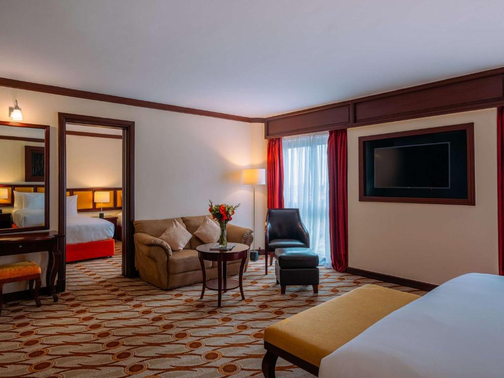 Postel nebo postele na pokoji v ubytování Mövenpick Hotel & Residences Nairobi