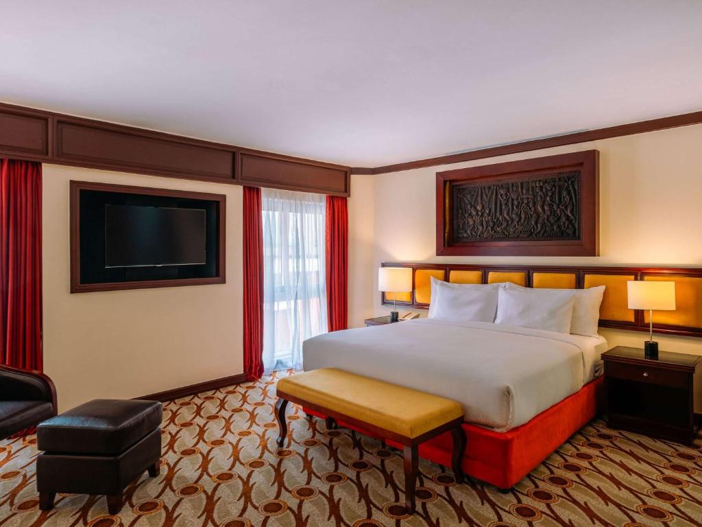 Postel nebo postele na pokoji v ubytování Mövenpick Hotel & Residences Nairobi