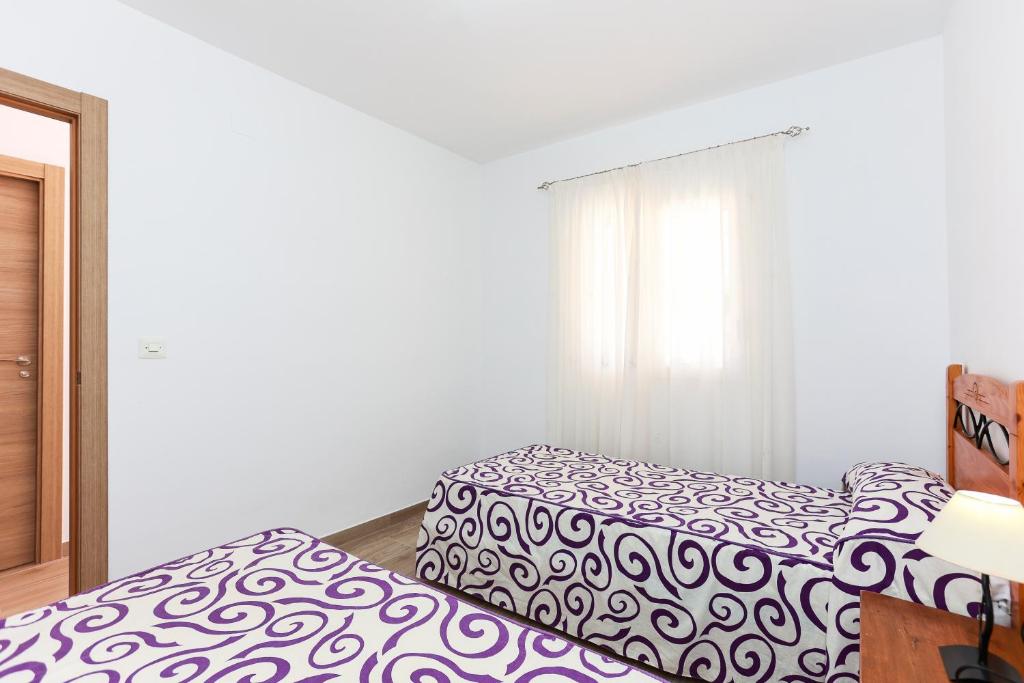 Postel nebo postele na pokoji v ubytování Villa Santa Lucia