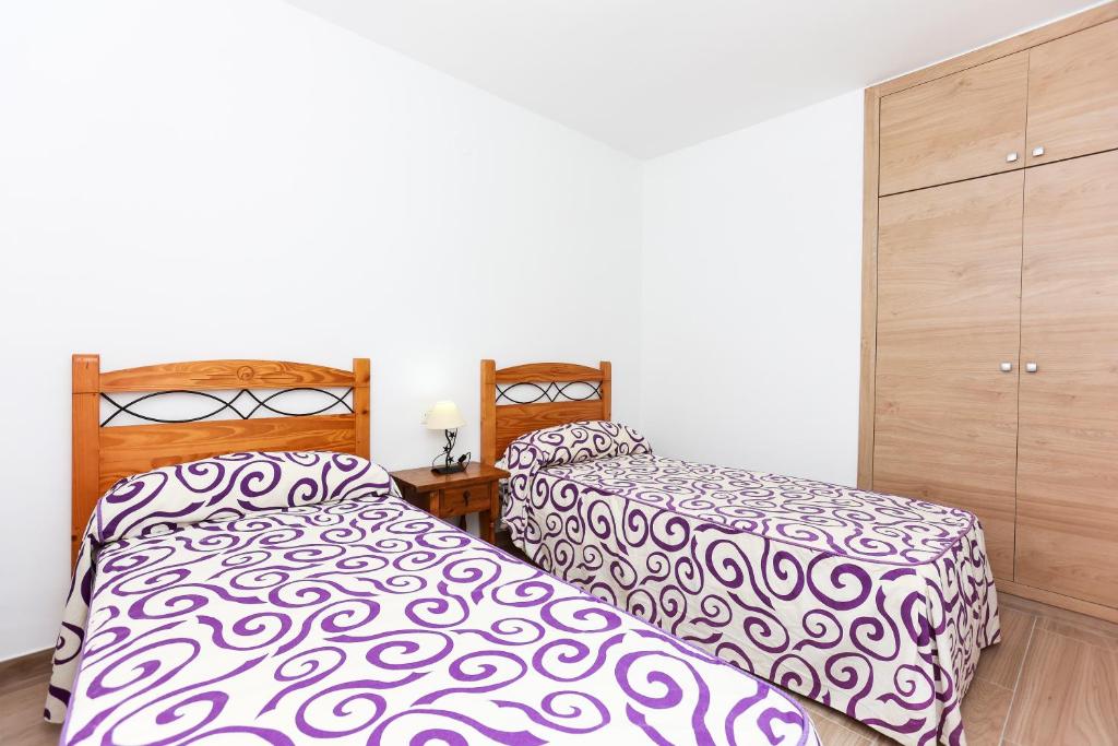 Postel nebo postele na pokoji v ubytování Villa Santa Lucia