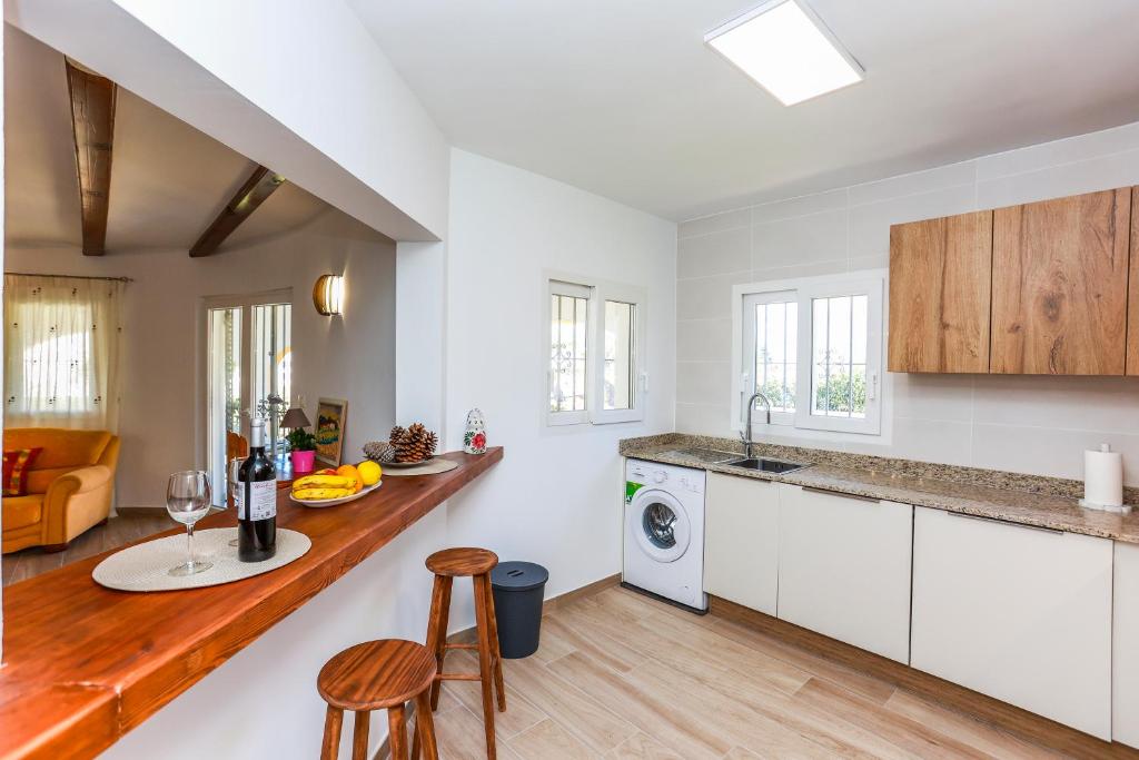 Kuchyň nebo kuchyňský kout v ubytování Villa Santa Lucia