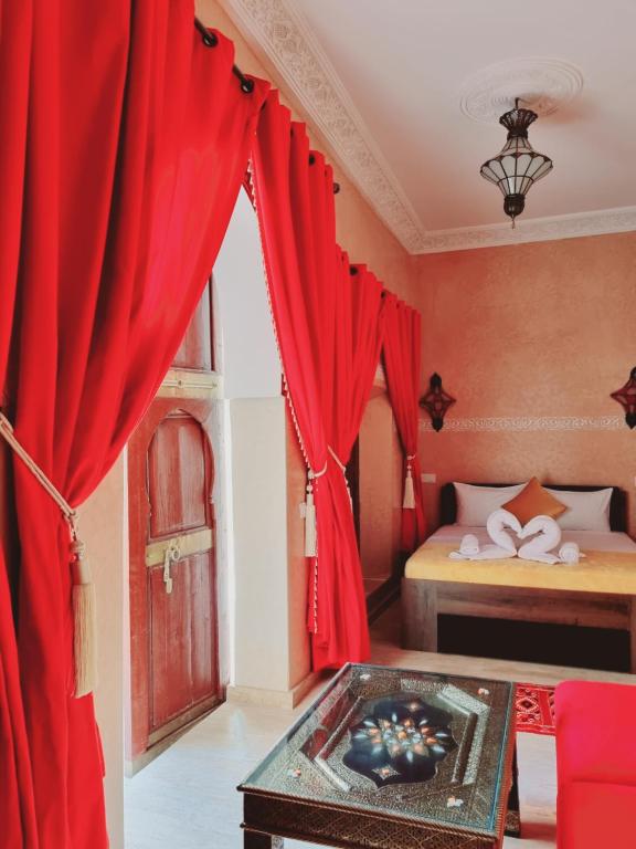 Postel nebo postele na pokoji v ubytování Riad La Bigarade