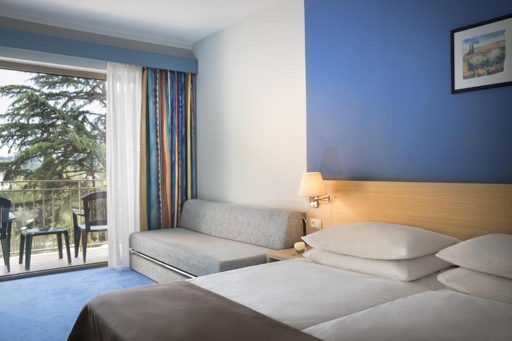 Prostor za sedenje u objektu Remisens Hotel LUCIJA