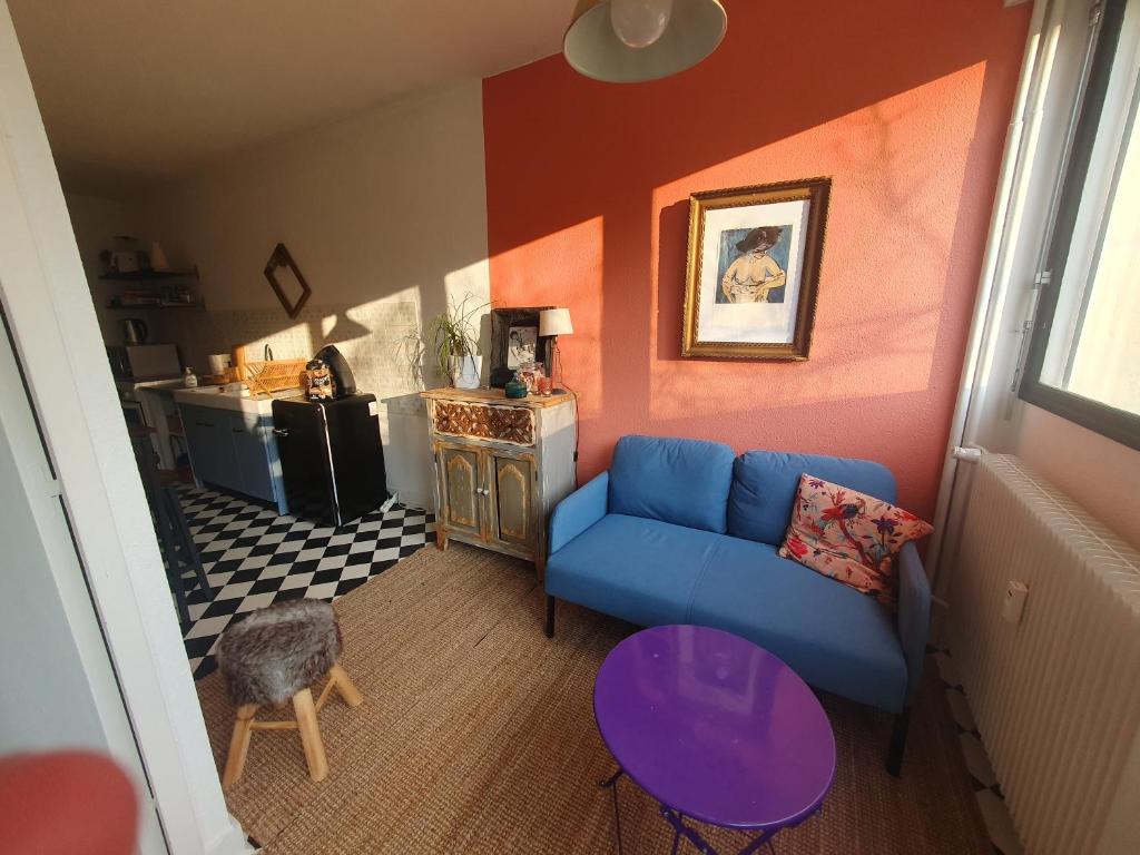 Χώρος καθιστικού στο L'atelier cosy